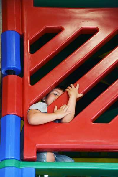 Hiding in the Burger King playground