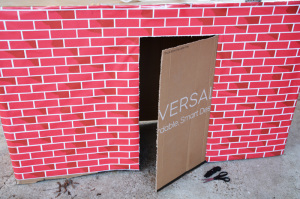 Cardboard box playhouse - cut door