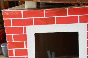 playhouse-glue-roof-pieces-to-bricks
